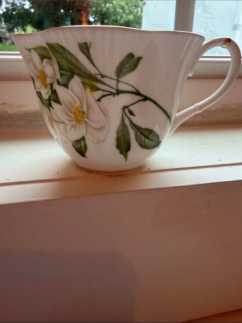 Royal Albert White Floral Teacup with Green Leaves and Gold Trim